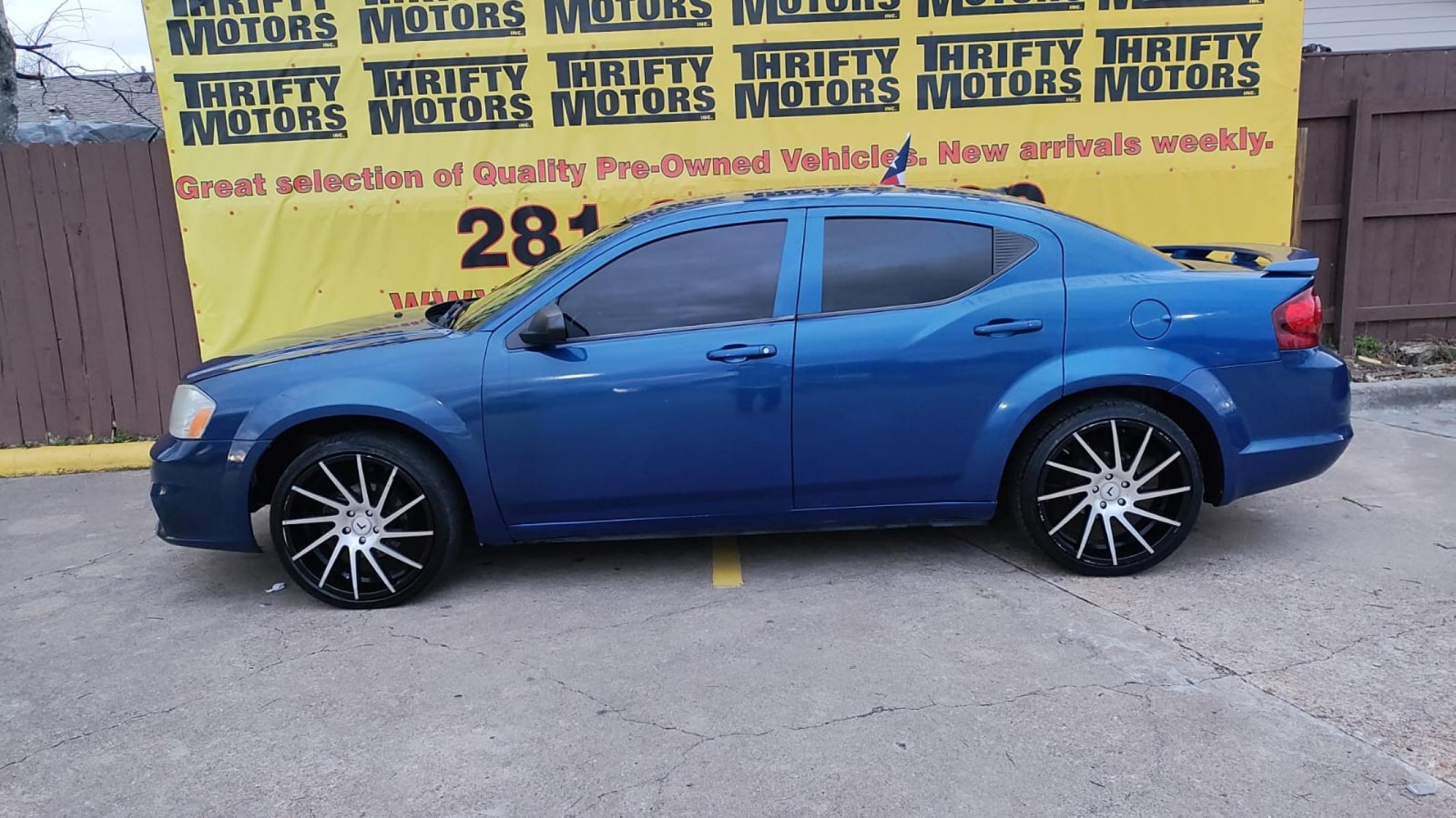 2014 Dodge Avenger SE (1C3CDZAB6EN) with an 2.4L L4 DOHC 16V engine, 4-Speed Automatic transmission, located at 16710 Clay Rd., Houston, TX, 77084, (281) 859-7900, 29.834864, -95.656166 - Photo #2